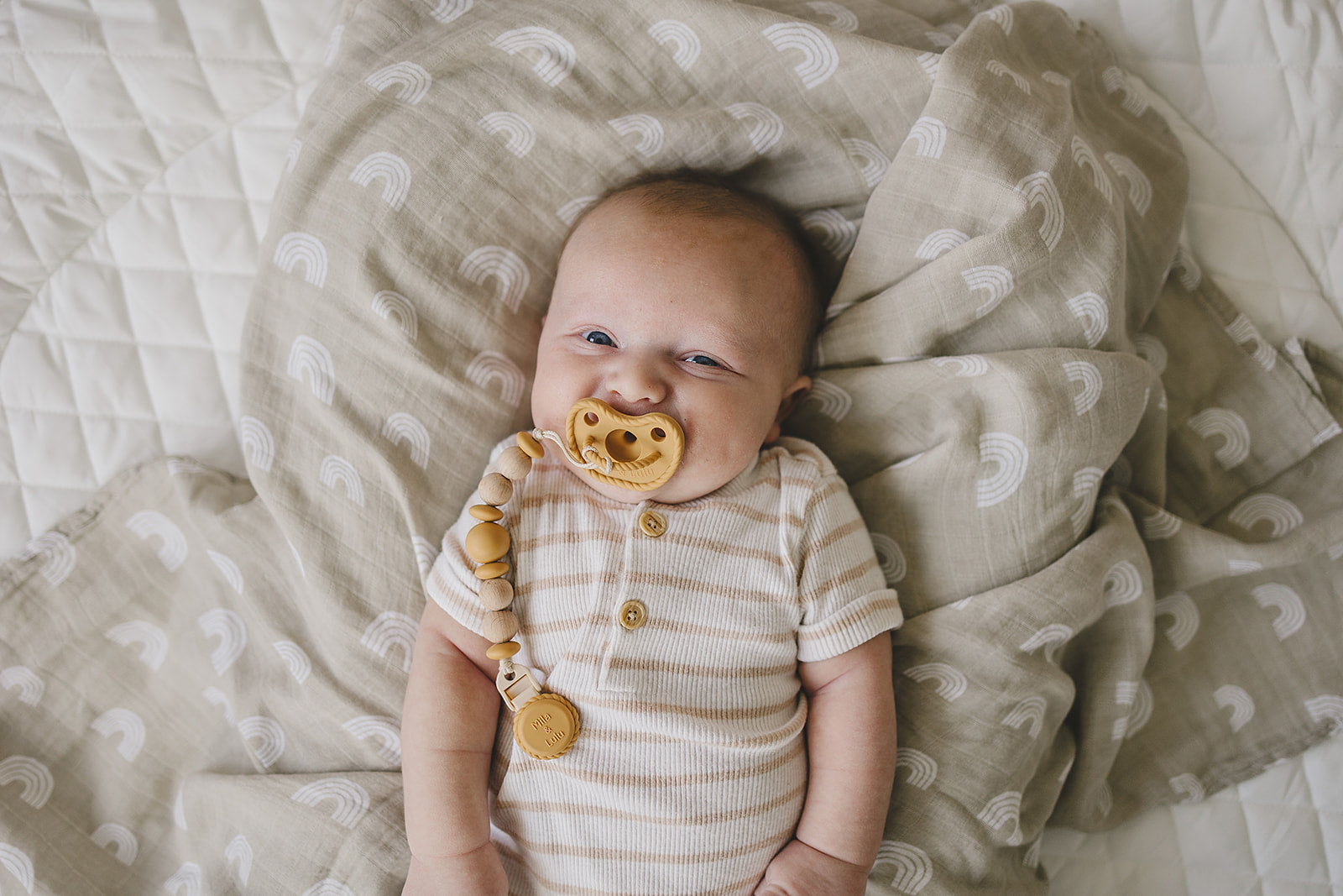 Mila and Lulu baby silicone pacifiers and clips sets. Non-toxic