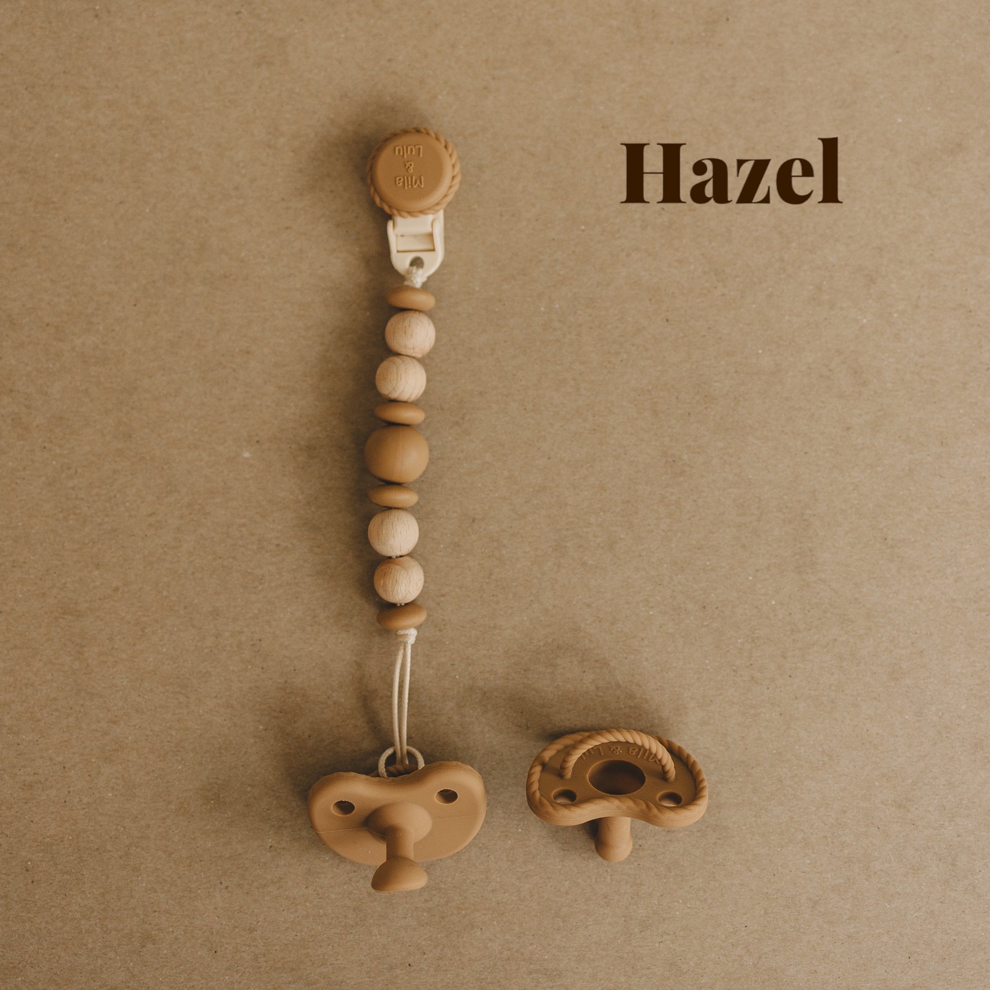Silicone non-toxic rust free pacifier clip in color Hazel