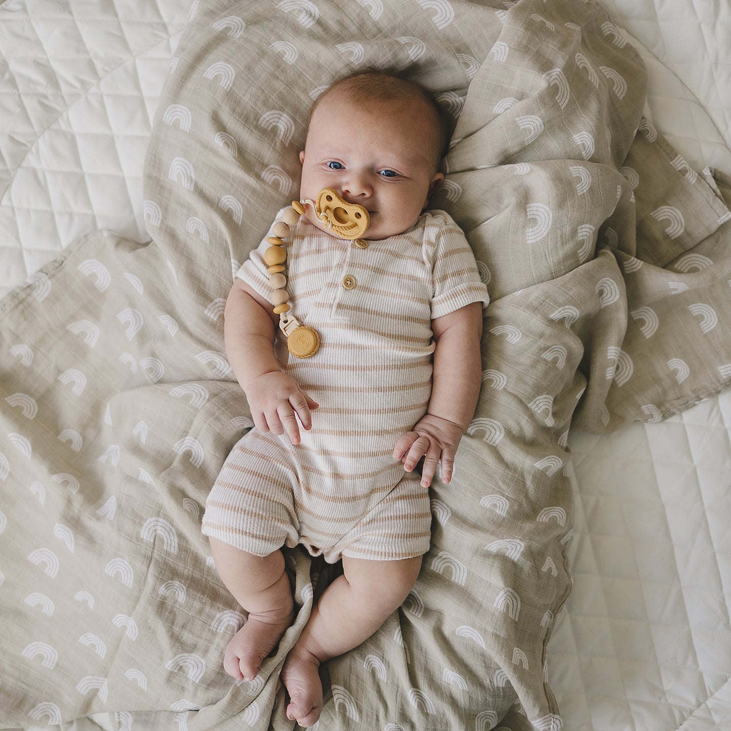Non- toxic silicone pacifier clip with BPA-free beaded design in color Sun